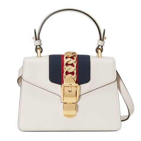 gucci 価格帯|white Gucci bag.